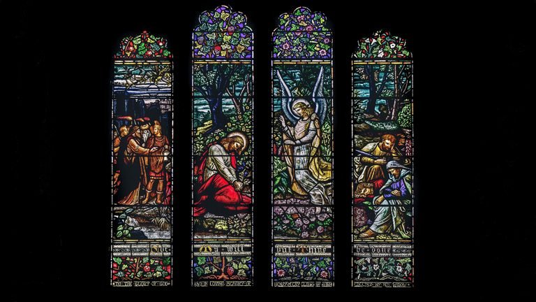 Stained glass artwork showing angels as described in the Bible.