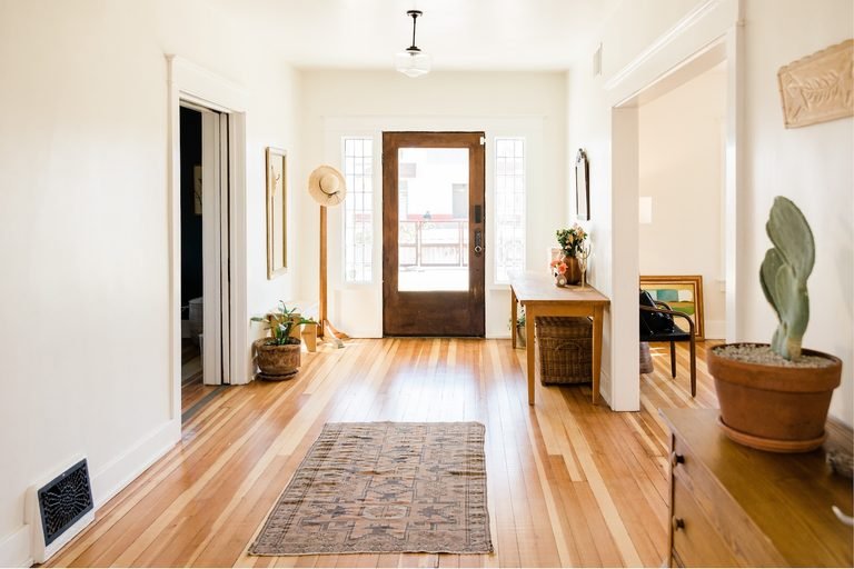 Bright home entryway for a Homeowners Maintenance Checklist.